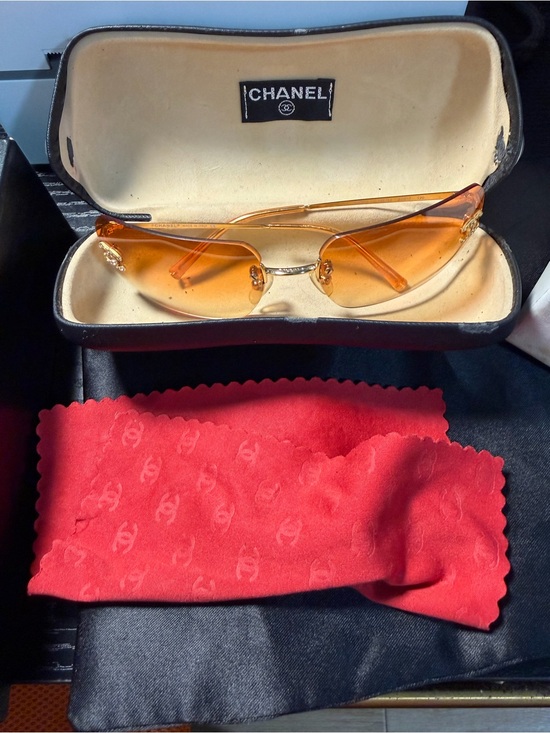 CHANEL Amber Lens Rimless Sunglasses with Gold Accents